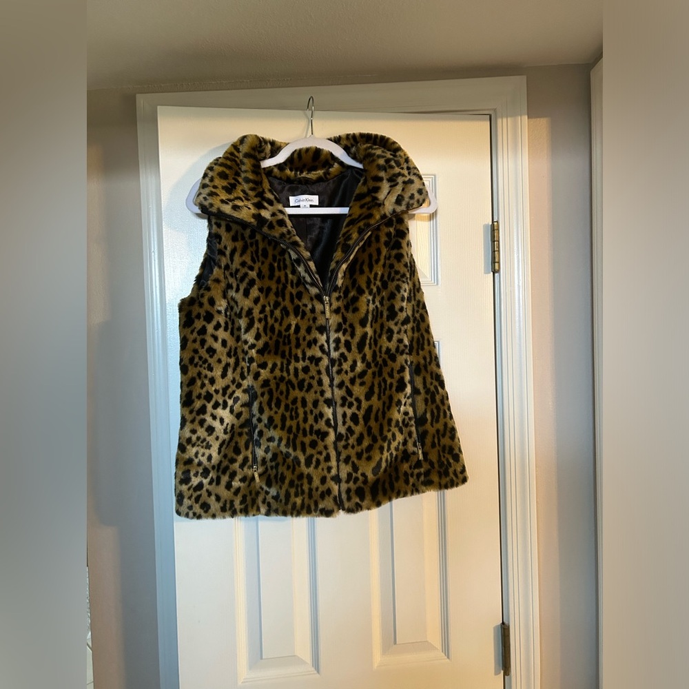 Beautiful and Cozy faux fur vest from Calvin Klein! .